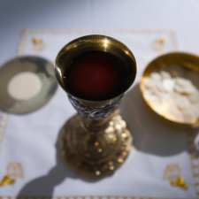 Chalice Large Host and Ciborium on the Altar