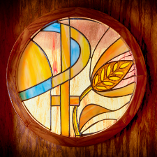 PX symbol in stained glass